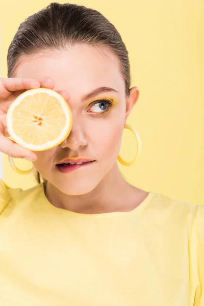 Beautiful Stylish Girl Holding Lemon Biting Lip Posing Isolated Limelight — Stock Photo, Image