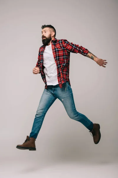 Handsome Stylish Man Checkered Shirt Jumping Isolated Grey — Stock Photo, Image