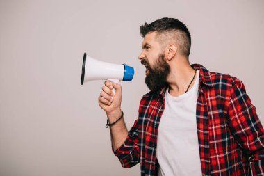 angry bearded man in checkered shirt screaming into megaphone, isolated on grey clipart