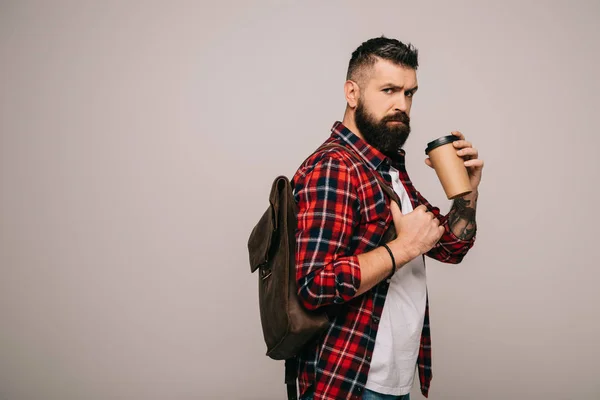 Serious Bearded Man Checkered Shirt Backpack Holding Coffee Isolated Grey — Stock Photo, Image