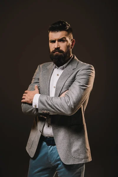 Handsome Businessman Posing Crossed Arms Isolated Brown — Stock Photo, Image