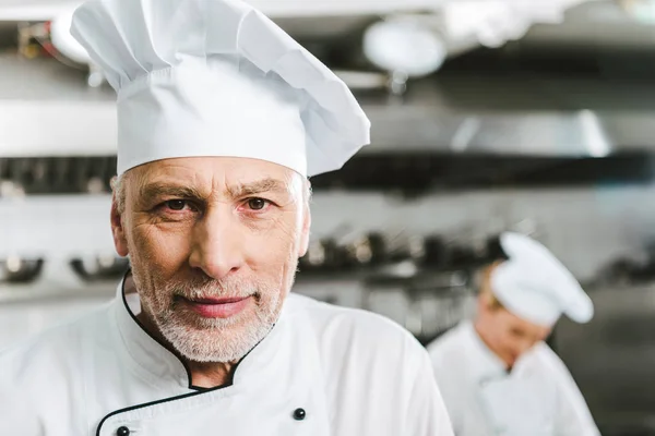 Handsome Male Chef Uniform Cap Looking Camera Restaurant Kitchen Copy — Stock Photo, Image