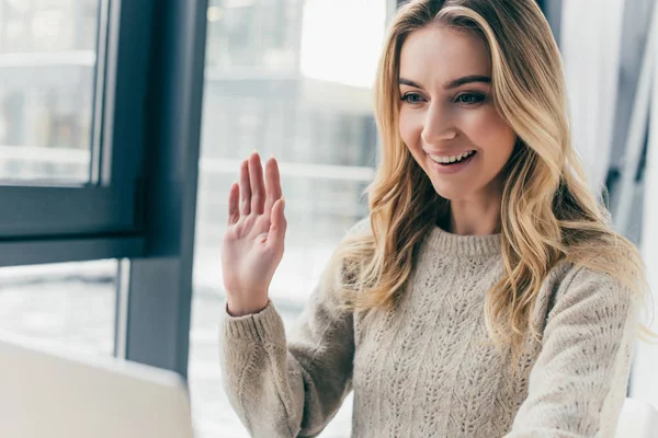 Cheerful Woman Waving Hand While Having Video Call — Stock Photo, Image