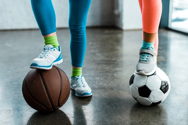 Cropped View Kids Sneakers Posing Balls Gym — Stock Photo, Image