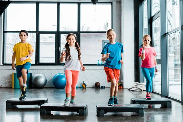 Active Preteen Children Training Step Platforms — Stock Photo, Image