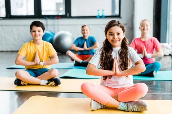 Cheerful Kids Smiling While Stretching Fitness Mats — Stock Photo, Image