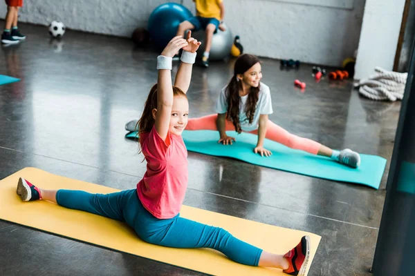 Happy Kids Smiling While Doing Twine Fitness Mats — Stock Photo, Image