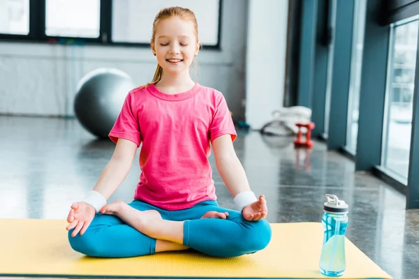 Ginger Kid Practicing Yoga Sitting Lotus Pose Closed Eyes — Stock Photo, Image