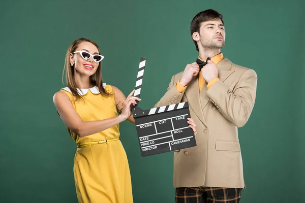 Woman Holding Film Clapperboard While Man Vintage Clothes Adjusting Tie — Stock Photo, Image