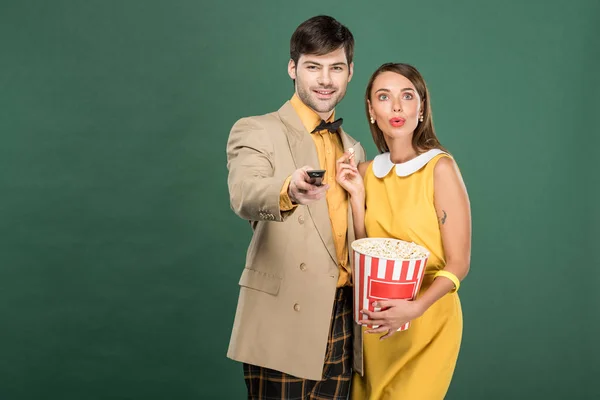 Beautiful Couple Vintage Clothes Remote Control Popcorn Watching Movie Isolated — Stock Photo, Image