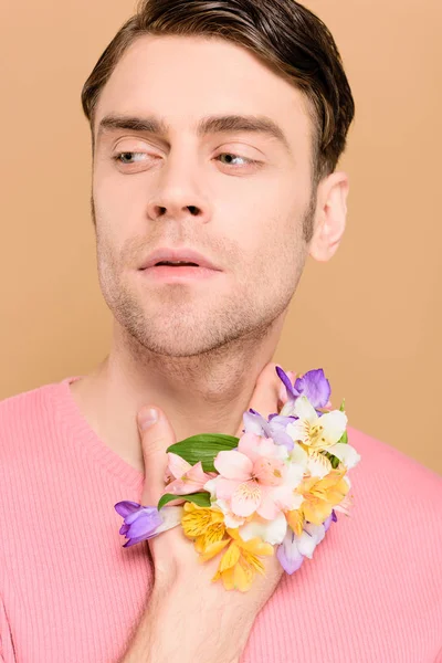 Man Holding Hand Flowers Neck Isolated Beige — Stock Photo, Image