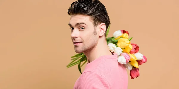 Cheerful Man Holding Bouquet Flowers Shoulder Isolated Beige — Stock Photo, Image
