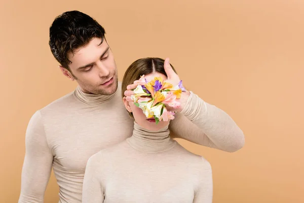 Handsome Man Alstroemeria Flowers Hand Covering Face Girlfriend Isolated Beige — Stock Photo, Image