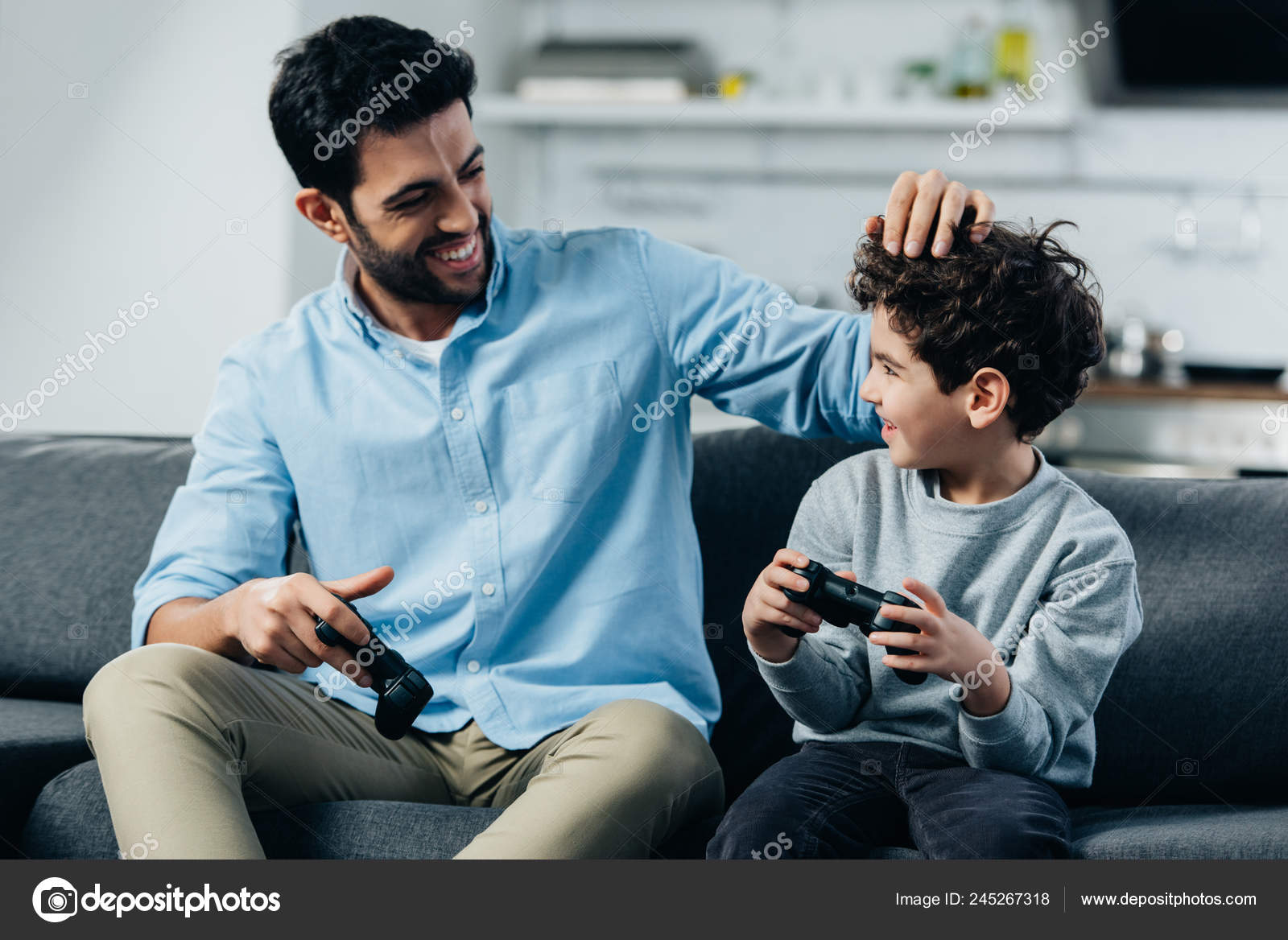 Happy Latin Father Touching Hair Cute Son Holding Joysticks Home Stock Photo by ©AllaSerebrina 245267318 Happy Latin Father Touching Hair Cute Son Holding Joysticks Home Stock Photo by ©AllaSerebrina 245267318