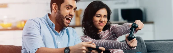 Happy Latin Man Playing Video Game Wife Home — Stock Photo, Image