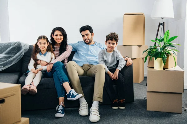 Cheerful Hispanic Family Sitting Sofa New Home — Stock Photo, Image