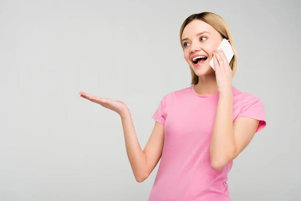 Happy Attractive Girl Pink Shirt Talking Smartphone Isolated Grey — Stock Photo, Image