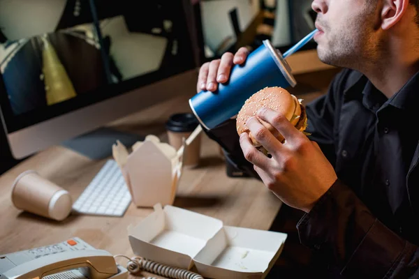 Cropped View Guard Drinking Holding Burger Workspace — Stock Photo, Image