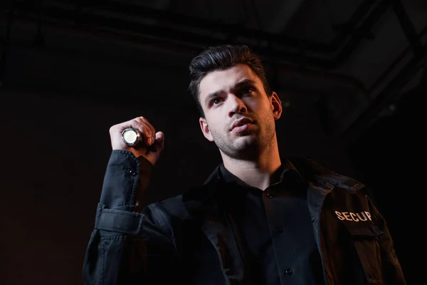 Handsome Guard Black Uniform Holding Flashlight — Stock Photo, Image