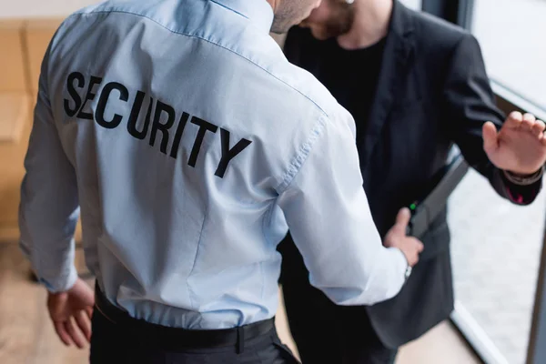 Partial View Guard Using Metal Detector — Stock Photo, Image