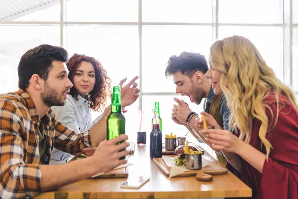 Handsome Beautiful Friends Holding Glass Bottles Drink Talking — Stock Photo, Image