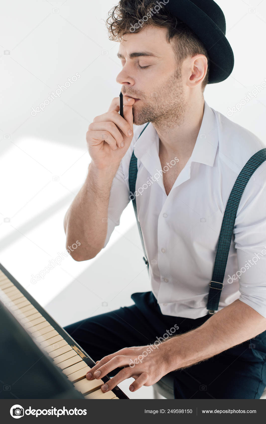 Thoughtful Man Composing Music While Sitting Piano Stock Photo Image By C Allaserebrina