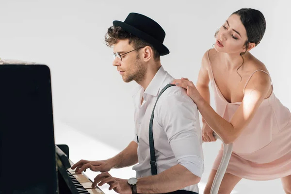 Handsome Pianist Playing Piano While Beautiful Ballerina Touching His Shoulder — Stock Photo, Image