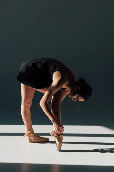 Young Ballerina Black Dress Fixing Pointe Shoes — Stock Photo, Image