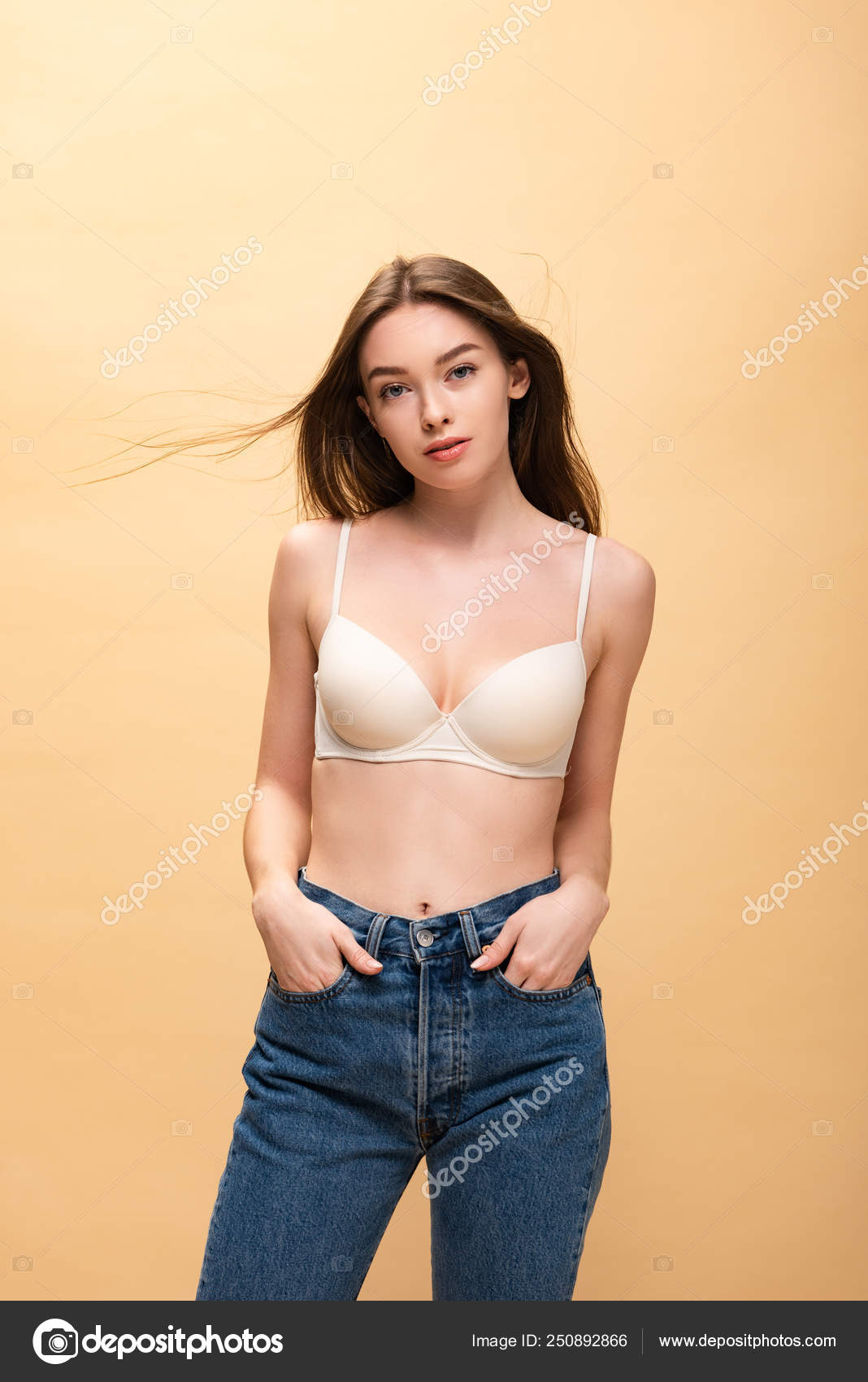 Beautiful Girl Blue Jeans Bra Looking Camera Isolated Beige Stock