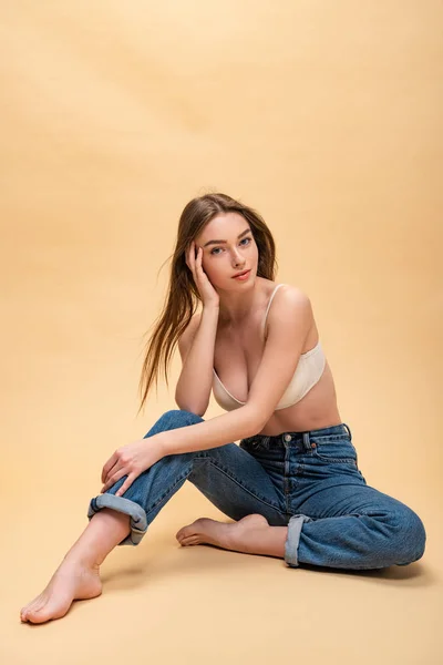 Happy Pretty Girl Blue Jeans Bra Sitting Looking Camera — Stock Photo, Image