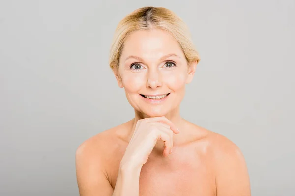 Attractive Smiling Mature Woman Touching Her Face Looking Camera Grey — Stock Photo, Image