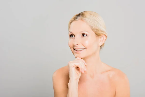 Attractive Smiling Mature Woman Touching Her Face Looking Away Grey — Stock Photo, Image