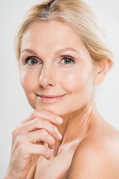 Beautiful Mature Woman Looking Camera Touching Her Face Grey Background — Stock Photo, Image