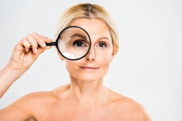 Beautiful Blonde Mature Woman Looking Camera Holding Loupe Grey Background — Stock Photo, Image