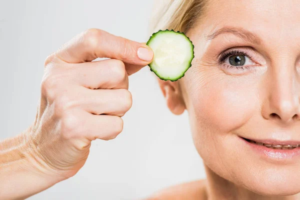 Partial View Beautiful Mature Woman Holding Cut Cucumber Grey Background — Stock Photo, Image