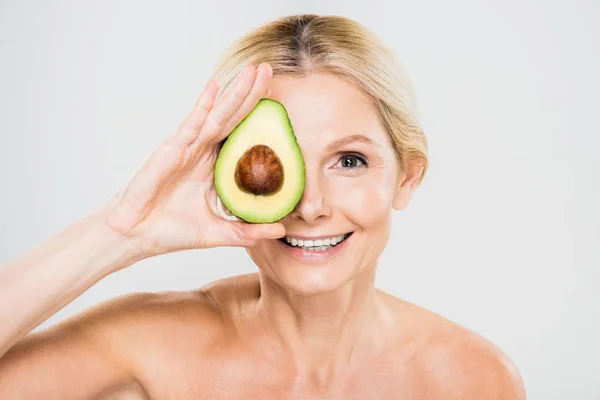 Beautiful Mature Woman Holding Avocado Looking Camera Isolated Grey — Stock Photo, Image