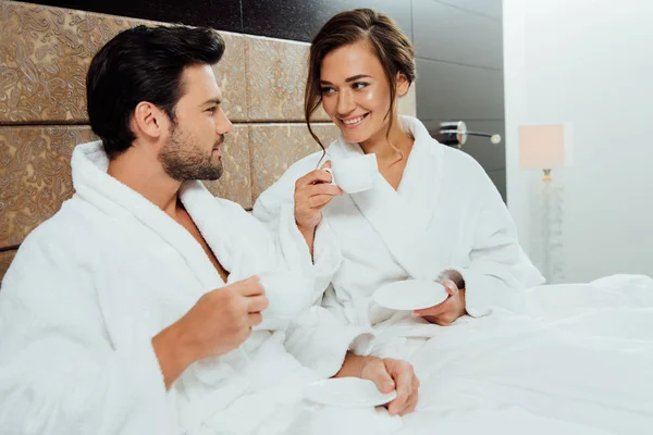 Bearded Man Pretty Girlfriend Holding Cups Coffee Bed — Stock Photo, Image