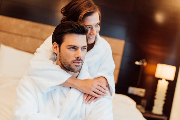 Happy Girlfriend White Bathrobe Hugging Handsome Boyfriend — Stock Photo, Image