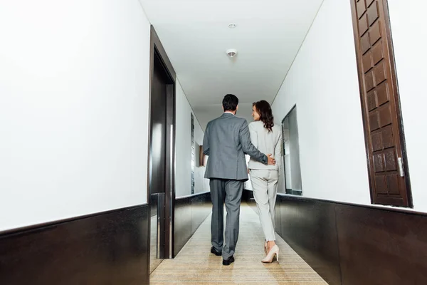 Back View Confident Businessman Hugging Businesswoman Formal Wear While Walking — Stock Photo, Image