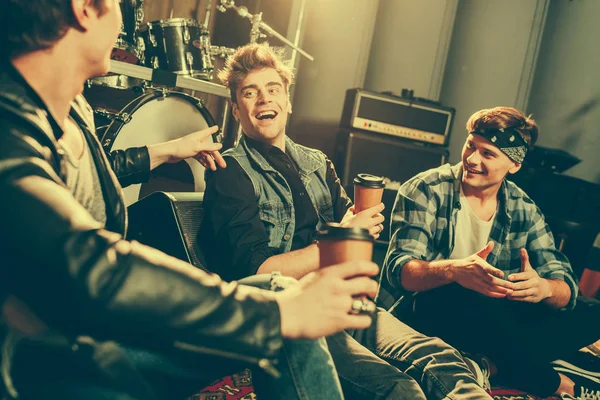 Selective Focus Happy Rock Band Laughing While Talking Holding Paper — Stock Photo, Image