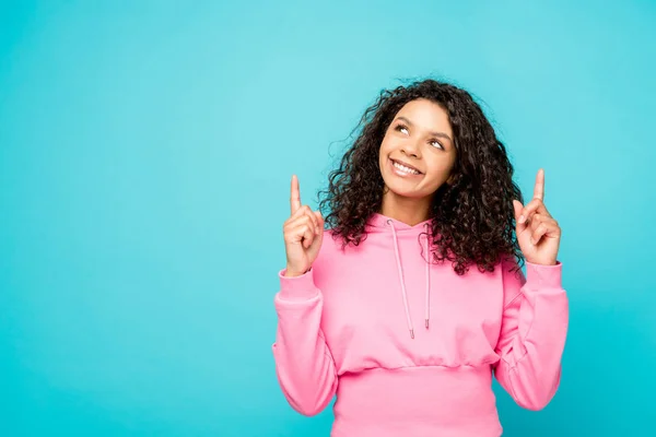 Happy Curly African American Girl Pointing Fingers Isolated Blue — Stock Photo, Image