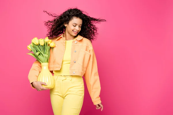 Cheerful African American Girl Holding Vase Yellow Tulips While Standing — Stock Photo, Image