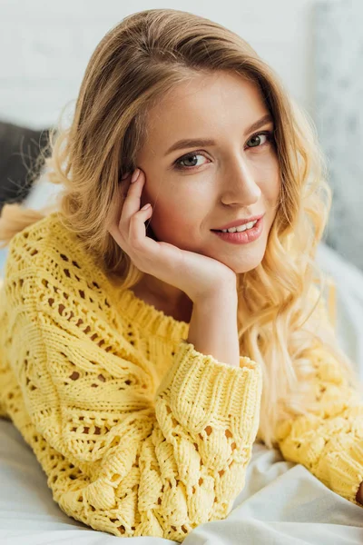 Beautiful Blonde Young Woman Knitted Sweater Touching Face Looking Camera — Stock Photo, Image