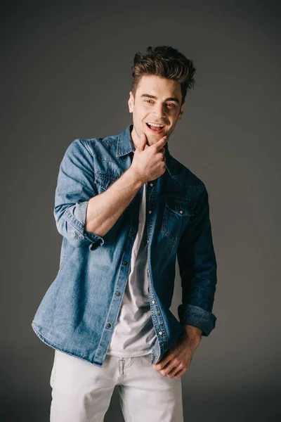 Smiling Handsome Man Denim Shirt Jeans Looking Camera Grey Background — Stock Photo, Image