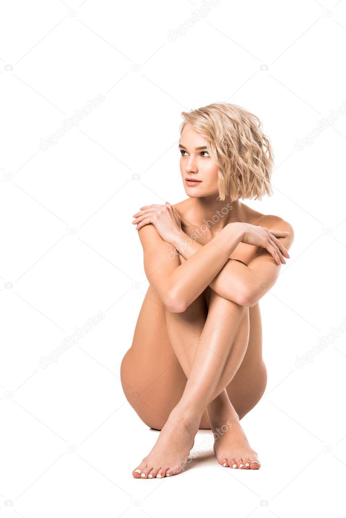beautiful naked blonde young woman posing isolated on white with copy space