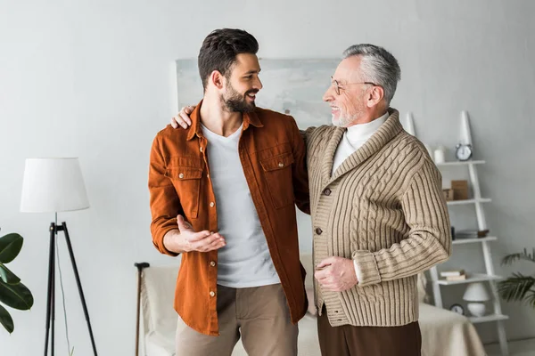 Handsome Man Gesturing Looking Cheerful Senior Father — Stock Photo, Image
