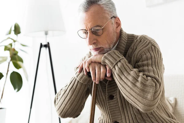 Pensive Retired Man Thinking While Holding Walking Stick — Stock Photo, Image
