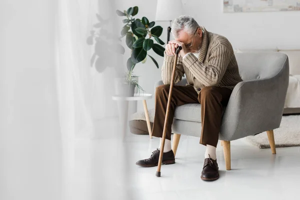 Upset Retired Man Sitting Armchair Walking Cane Home — Stock Photo, Image