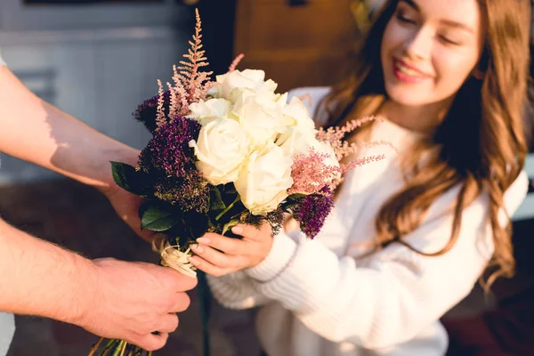 Cropped View Man Giving Flowers Happy Young Woman — Stock Photo, Image