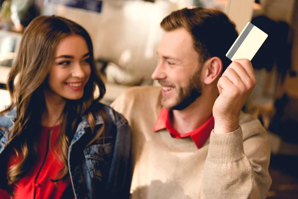 Cheerful Man Holding Credit Card Looking Happy Young Woman Cafe — Stock Photo, Image